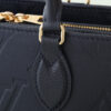5 Louis Vuitton M23640 Deep Blue Embossed: This small OnTheGo handbag is crafted from Monogram Empreinte leather, embossed with the Giant Monogram pattern.