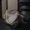 Louis Vuitton Crafted from classic Monogram canvas, this small Boulogne handbag features a double-zip closure and a spacious interior flat pocket large enough to accommodate a smartphone.