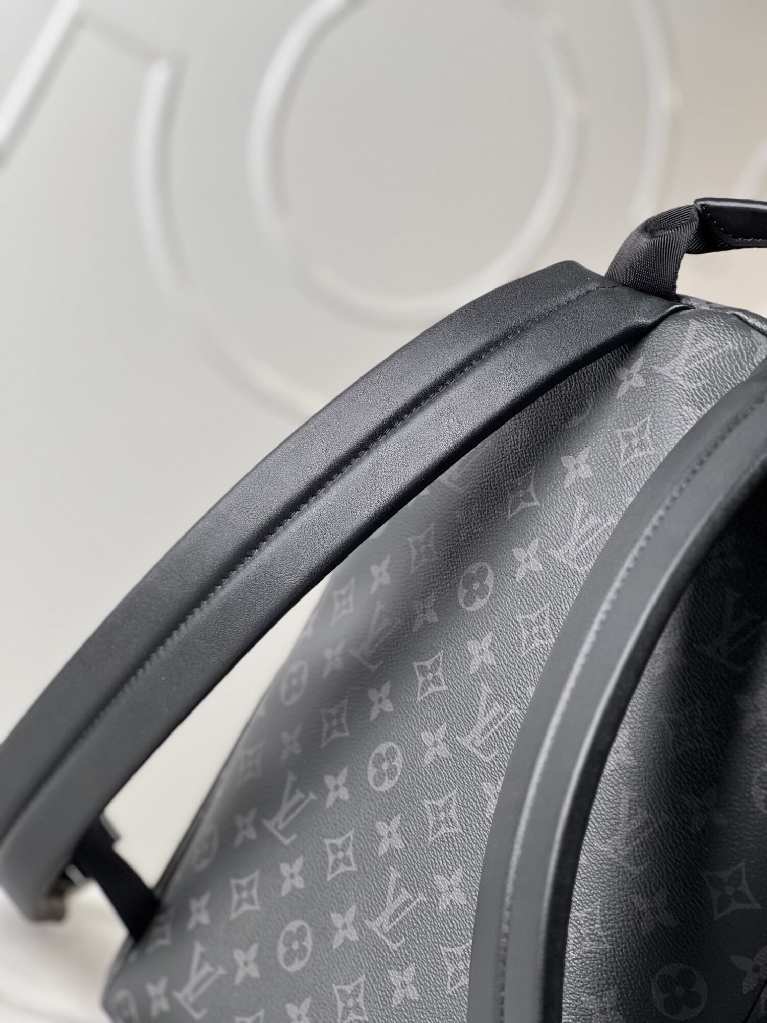 6 Crafted from Monogram Eclipse canvas, this small Discovery backpack retains its versatile functionality in a more compact silhouette.