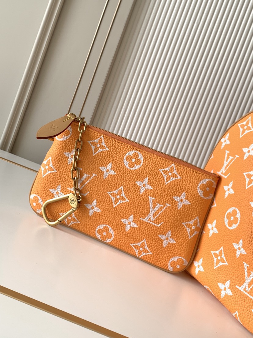 6 Louis Vuitton M14064 Orange: This Sedy Bandoulière 30 handbag features a design rendered upon a surface of refined cowhide leather.