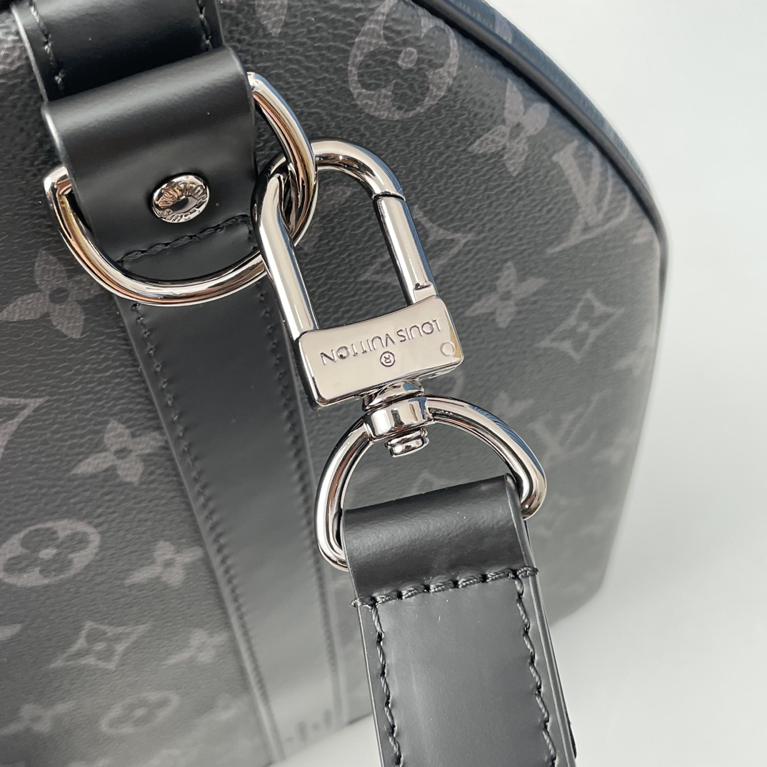 6 Louis Vuitton The Keepall 50 travel bag, crafted from the new, iconic black and grey Monogram Eclipse canvas.
