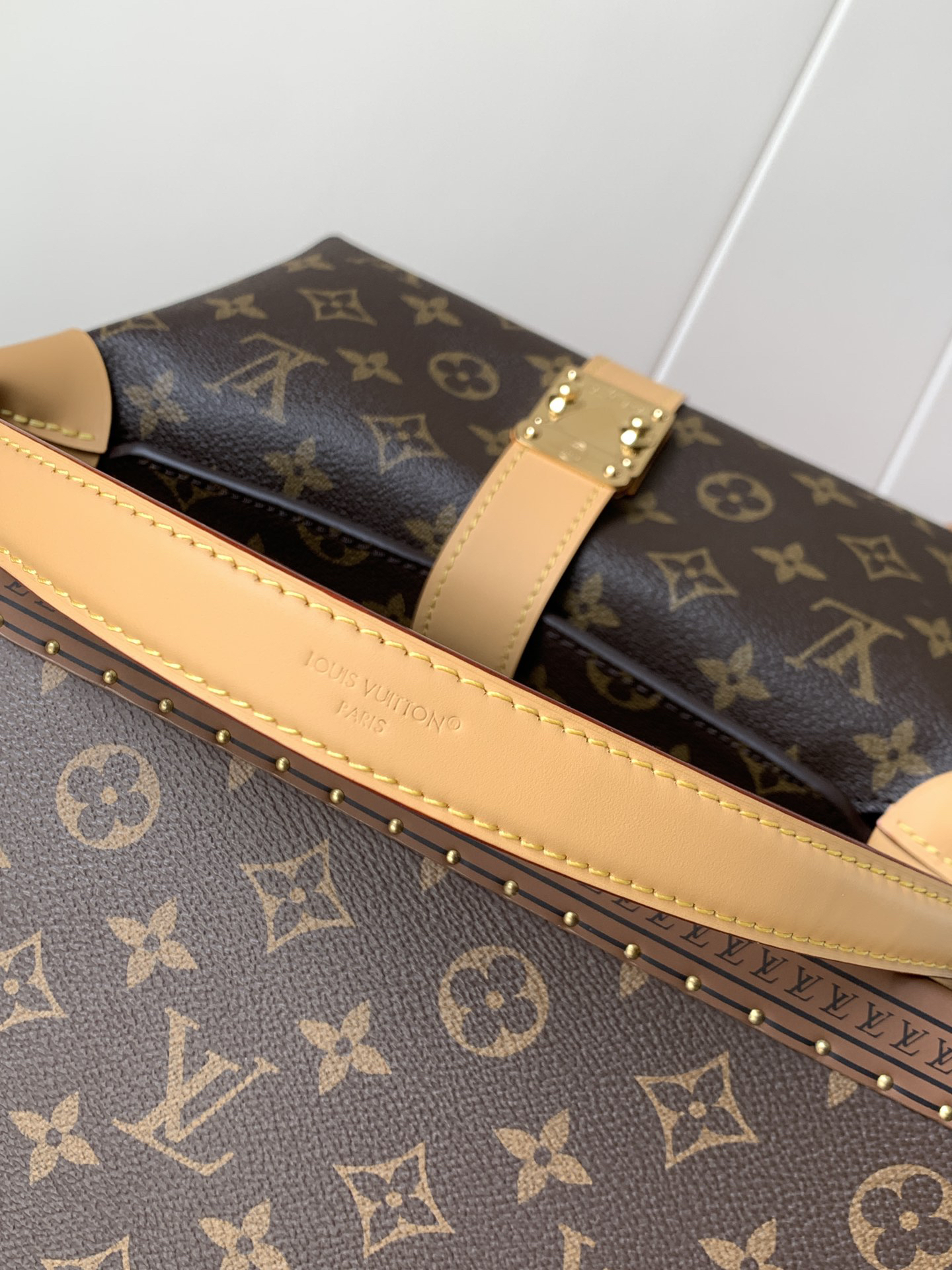 6 Louis Vuitton This Pochette Mia handbag, part of the Monogram collection, features a Monogram canvas body accented with cowhide leather trim.