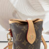 6 Louis Vuitton Mini Ice Cream Cone Bag — New "Fold Me" Mini Model, featuring a magnetic button closure design.
