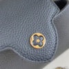 6 The Capucines Mini handbag, part of the Capucines Chain On You collection, is crafted from soft Taurillon calf leather to offer ample space.