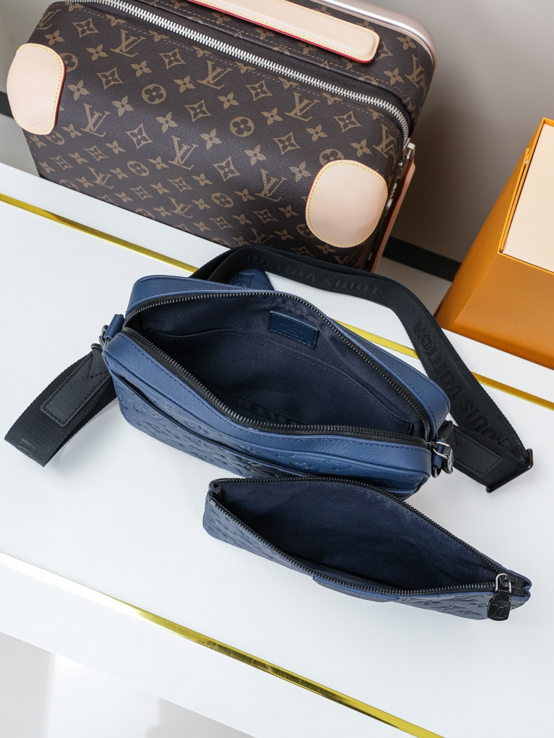 6 Louis Vuitton This Trio Messenger bag is crafted from soft Monogram Shadow calf leather.