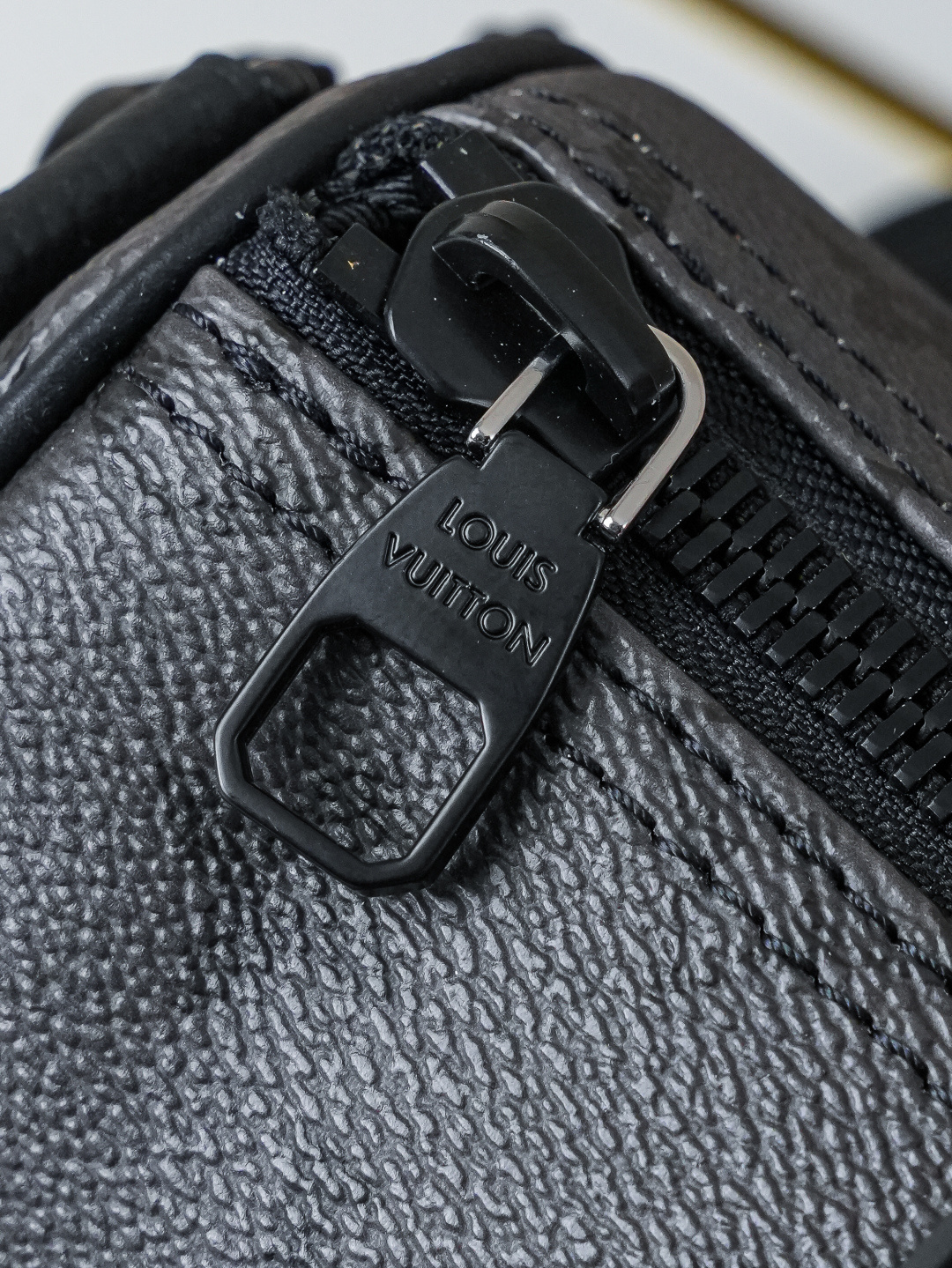 6 Louis Vuitton This Keell Bandoulière 25 handbag features Monogram Midnight coated canvas accented with a deep Monogram print.