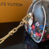 Louis Vuitton This Speedy Bandoulière 20 handbag combines Monogram canvas with cowhide leather trim.