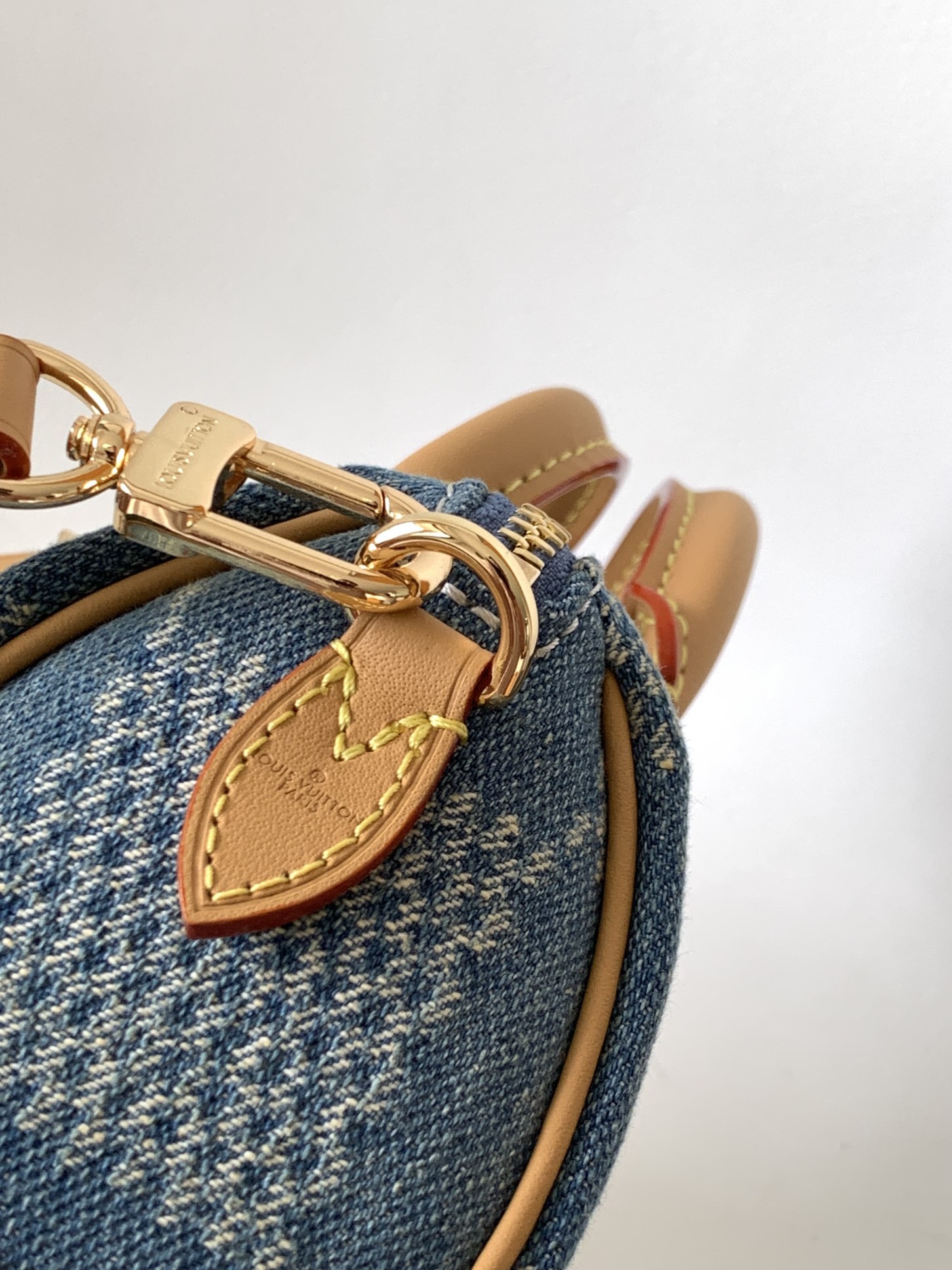 6 Louis Vuitton N40682 — FW New Denim Collection. The Sunset bag takes center stage in Monogram Denim canvas.