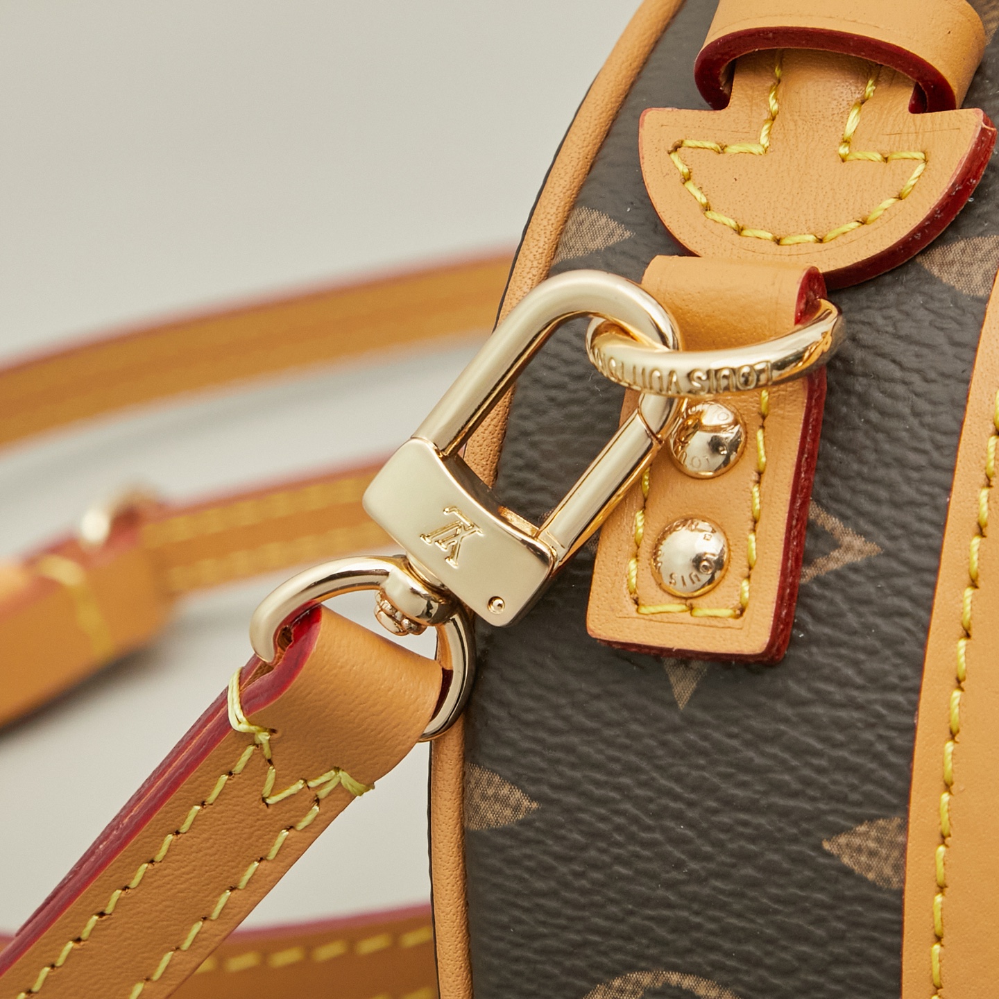 Louis Vuitton M44699 Monogram Canvas / M68276 Yellow Monogram: The Mini Boîte Chapeau handbag features a classic silhouette crafted from Monogram canvas.