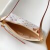 7 Louis Vuitton This Carryall East-West canvas handbag illuminates this classic element with a vibrant splash of color.