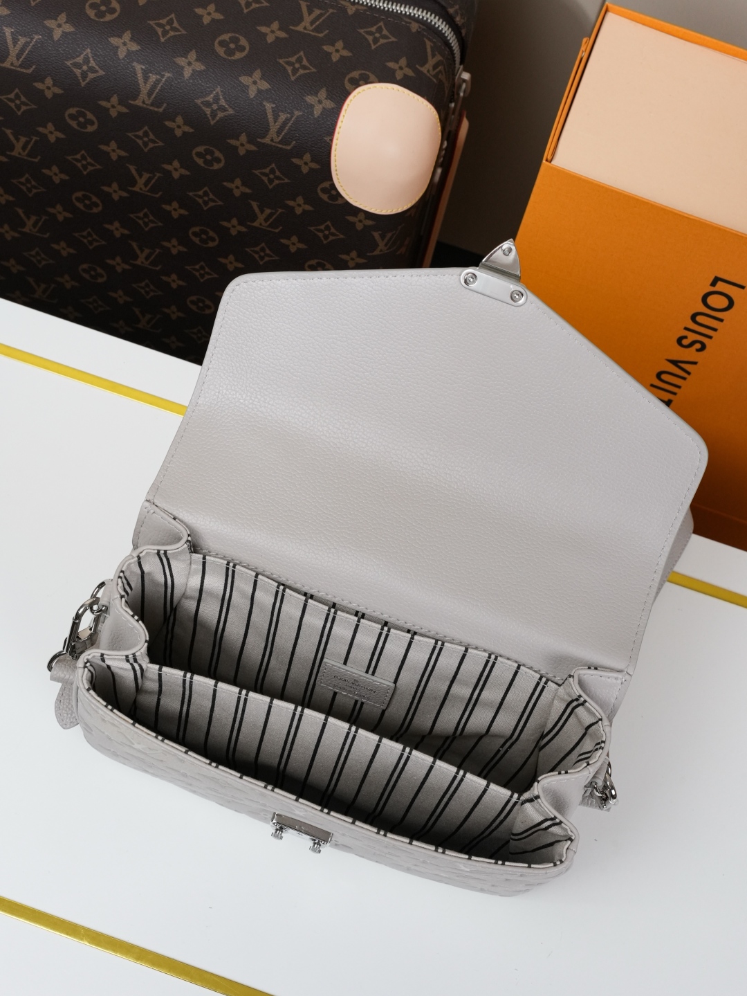 Louis Vuitton The Pochette Métis handbag interprets classic collegiate style through a design that is understated yet full of ingenious details.