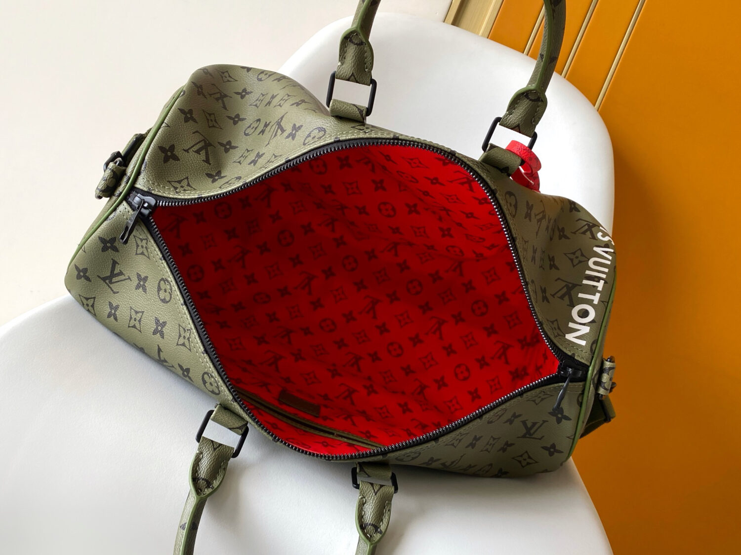 7 Louis Vuitton This Keepall Bandoulière 45 travel bag is part of the Monogram Tones collection.