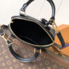 Louis Vuitton This Alma BB handbag showcases the iconic Alma BB silhouette, crafted from the House's exceptionally soft Monogram Empreinte leather.