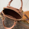 7 Louis Vuitton This Alma BB handbag showcases the iconic Alma BB silhouette, crafted from the House's exceptionally soft Monogram Empreinte leather.