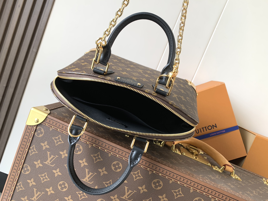 7 Louis Vuitton The Trunk collection welcomes a contemporary new iteration of the Alma Small handbag, paying homage to the brand's travel heritage with exquisite metal hardware.