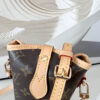 7 Louis Vuitton Mini Ice Cream Cone Bag — New "Fold Me" Mini Model, featuring a magnetic button closure design.