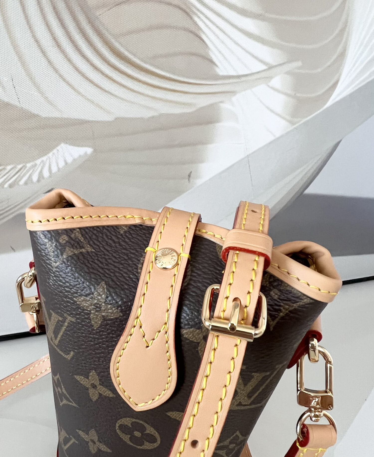 7 Louis Vuitton Mini Ice Cream Cone Bag — New "Fold Me" Mini Model, featuring a magnetic button closure design.