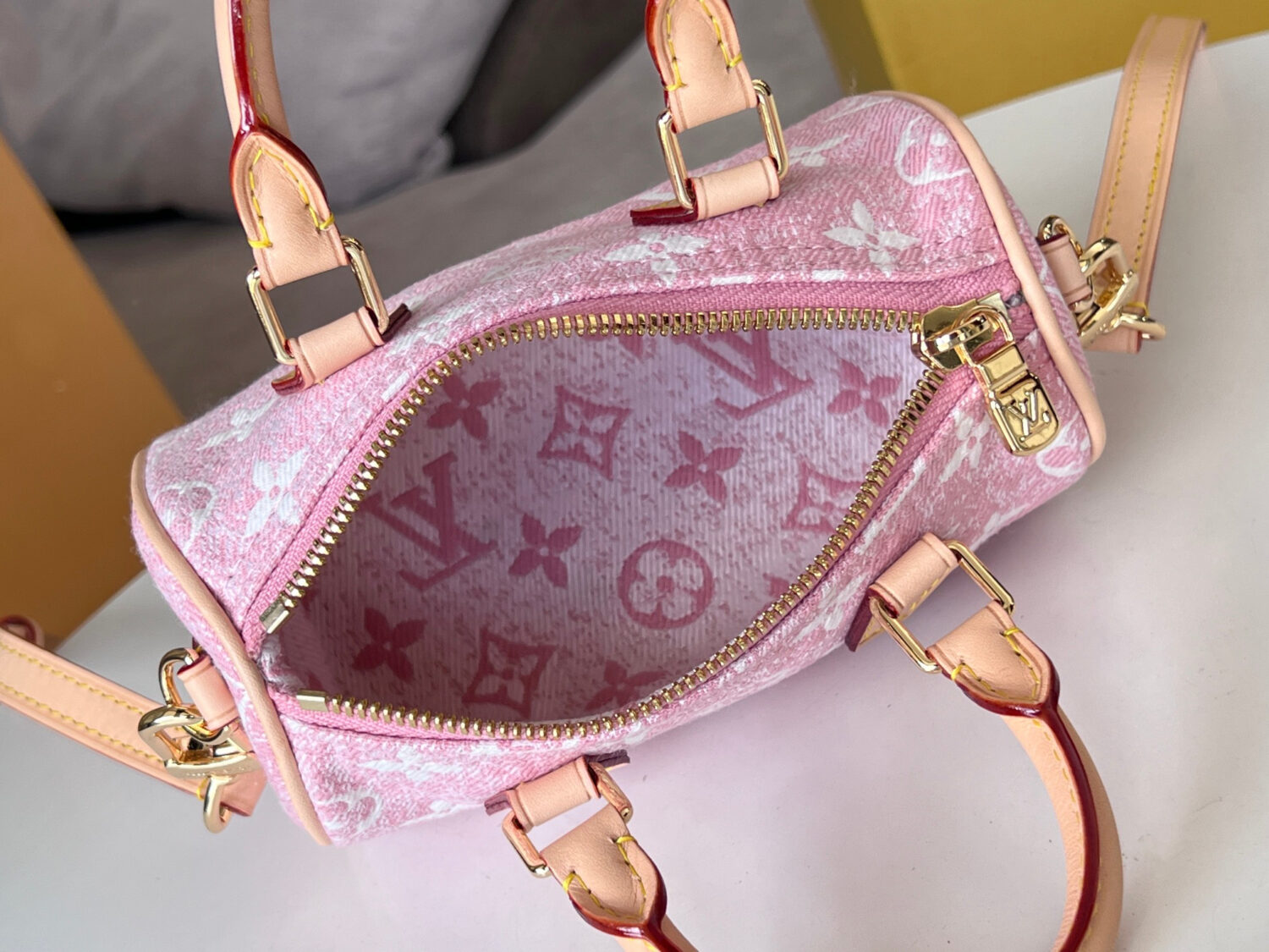 7 Louis Vuitton The Nano Speedy handbag crafted from classic Monogram canvas.