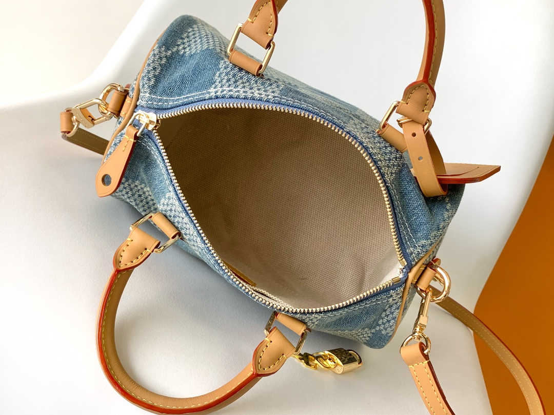 7 Louis Vuitton The new FW Denim Speedy 25 handbagâwhether worn crossbody...