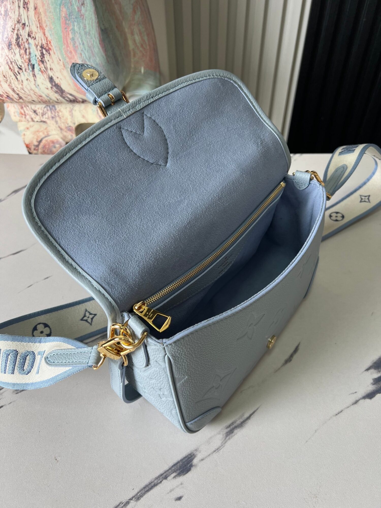 7 Louis Vuitton This Diane handbag infuses Monogram Empreinte embossed leather with elegant tones.