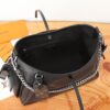 7 Louis Vuitton This small CarryAll Cargo handbag is crafted from soft lambskin, featuring a stylishly micro-crinkled finish.