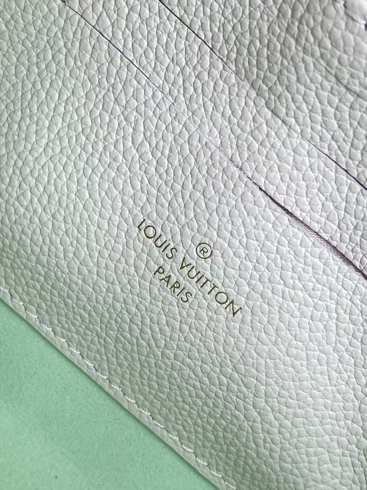 Louis Vuitton This Nano Madeleine handbag reimagines the Madeleine in Monogram Empreinte leather.