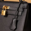 8 Hermes Kelly bag, black, 25cm, with gold hardware.