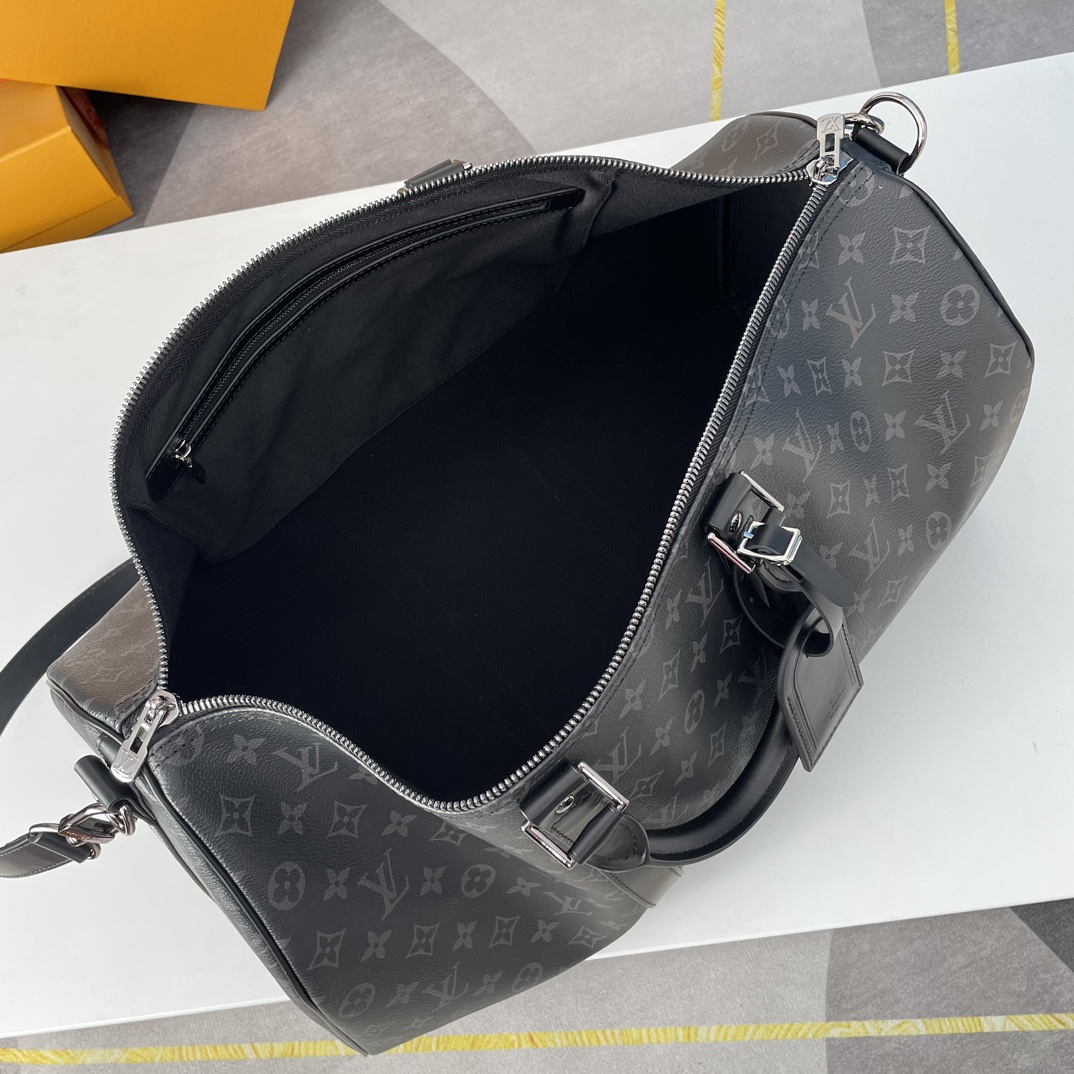 8 Louis Vuitton The Keepall 50 travel bag, crafted from the new, iconic black and grey Monogram Eclipse canvas.