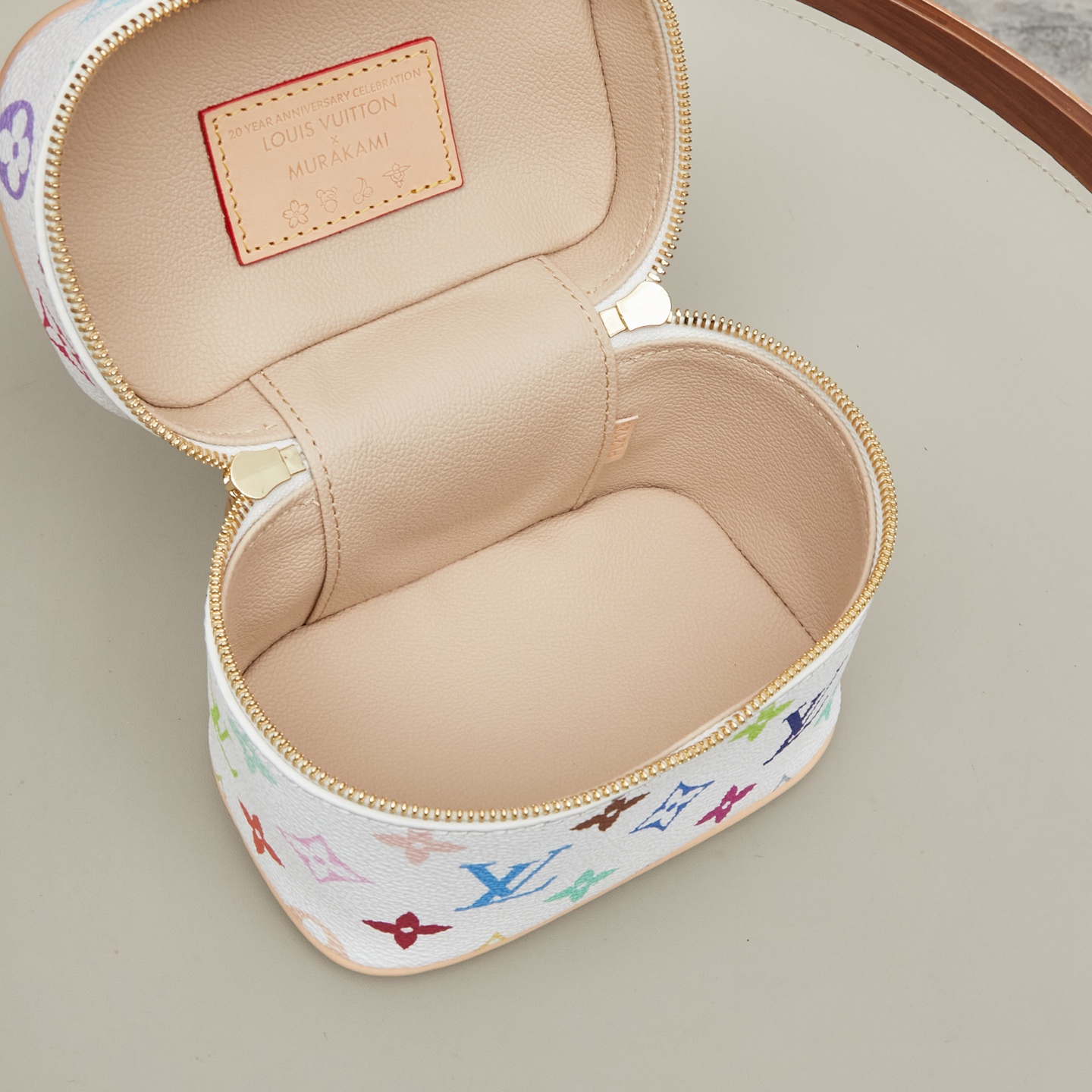 8 The Nice Nano bag, part of the 2025 Takashi Murakami collaboration, features a delicate design crafted from Monogram canvas.