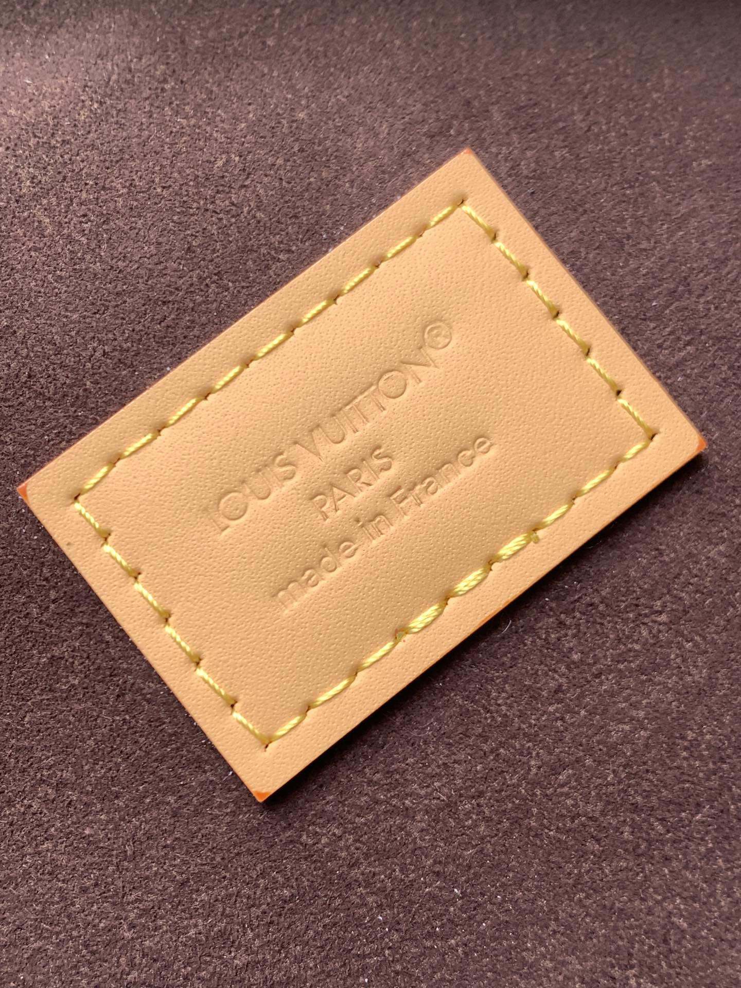 8 Louis Vuitton This Pochette Mia handbag, part of the Monogram collection, features a Monogram canvas body accented with cowhide leather trim.