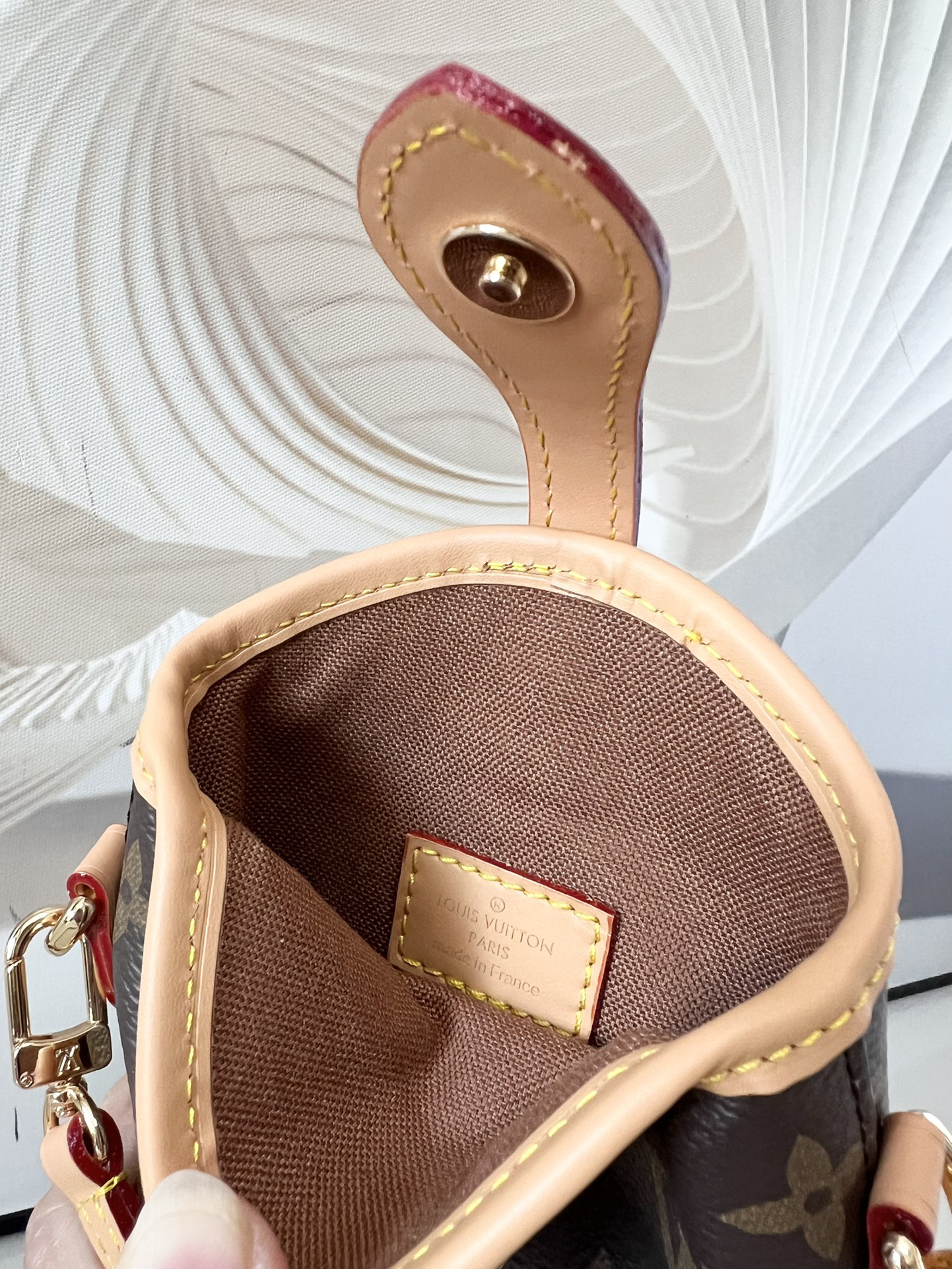 8 Louis Vuitton Mini Ice Cream Cone Bag — New "Fold Me" Mini Model, featuring a magnetic button closure design.