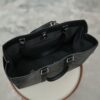 8 Louis Vuitton M46451 Black Monogram: A spacious handbag from the Sac Plat collection, the Sac Plat 24H features leather trim.