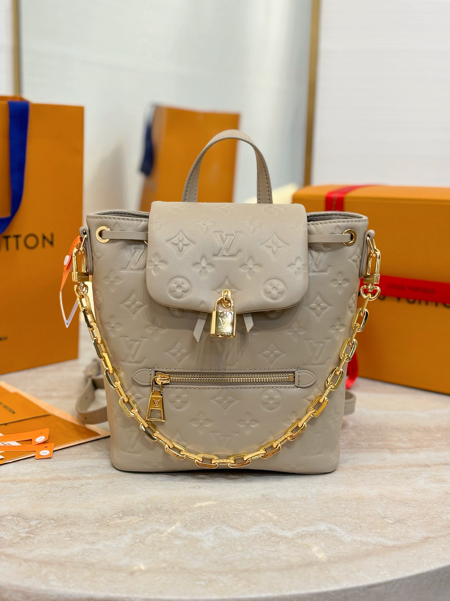Louis Vuitton The Coussin Backpack small handbag, featuring a striking backpack design, joins the Coussin collection.