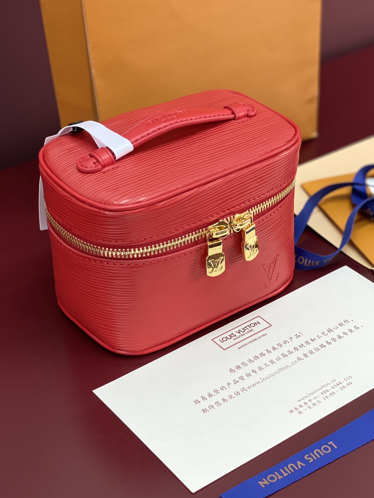 Louis Vuitton M25855 Red Small! New Season NICE NANO Bag with Grain Texture. This Nice Nano bag features a grained finish.