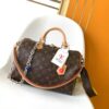 Louis Vuitton The Speedy Soft 30 Boho handbag is made from classic Monogram coated canvas.