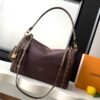 Louis Vuitton M26397 Ebony Color. This Express medium-sized handbag is crafted from supple cowhide leather and effortlessly complements various urban styles.