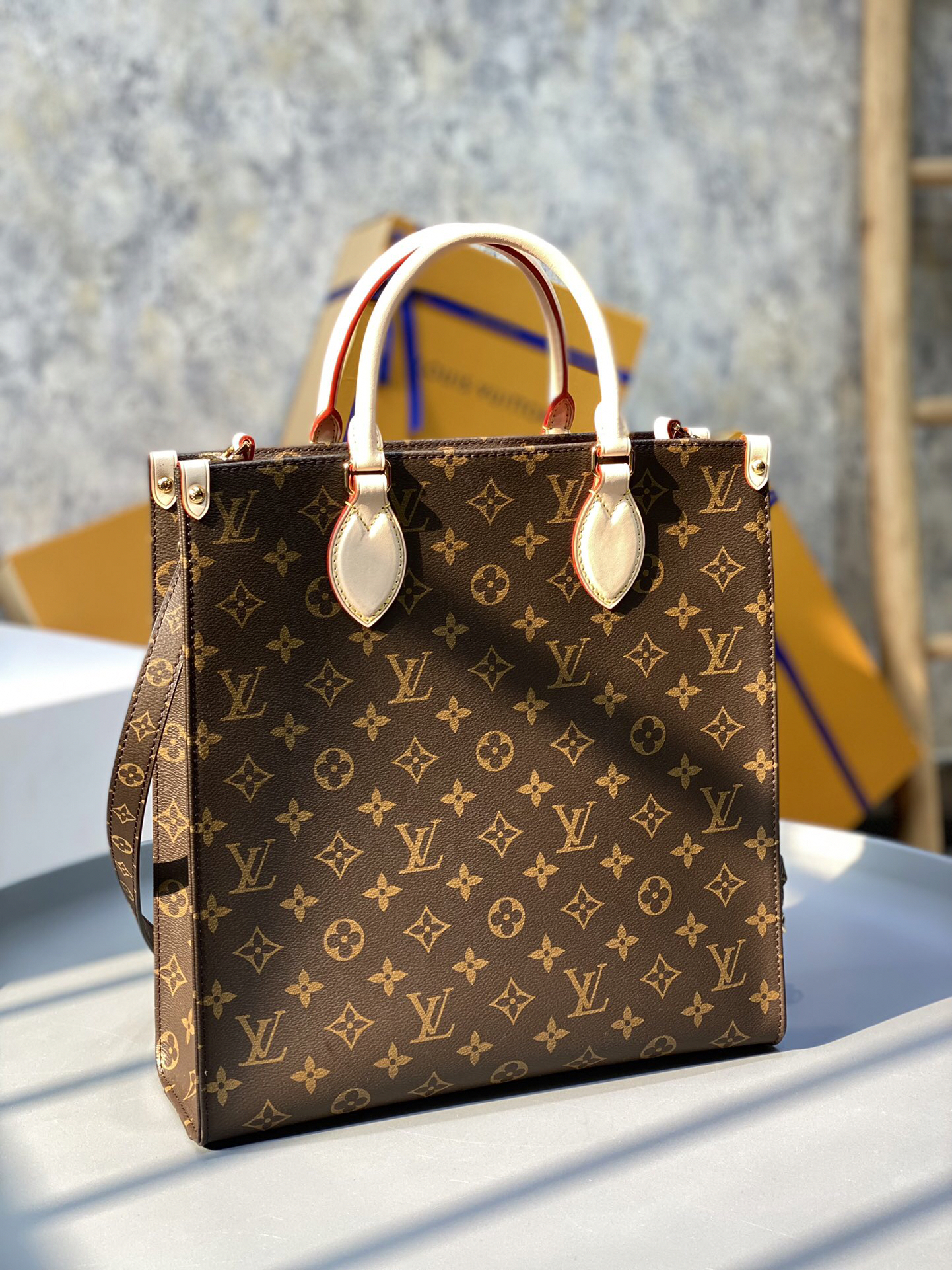 Louis Vuitton The M45848 classic Sac Plat medium handbag incorporates contemporary trends with its Monogram canvas and leather trim.
