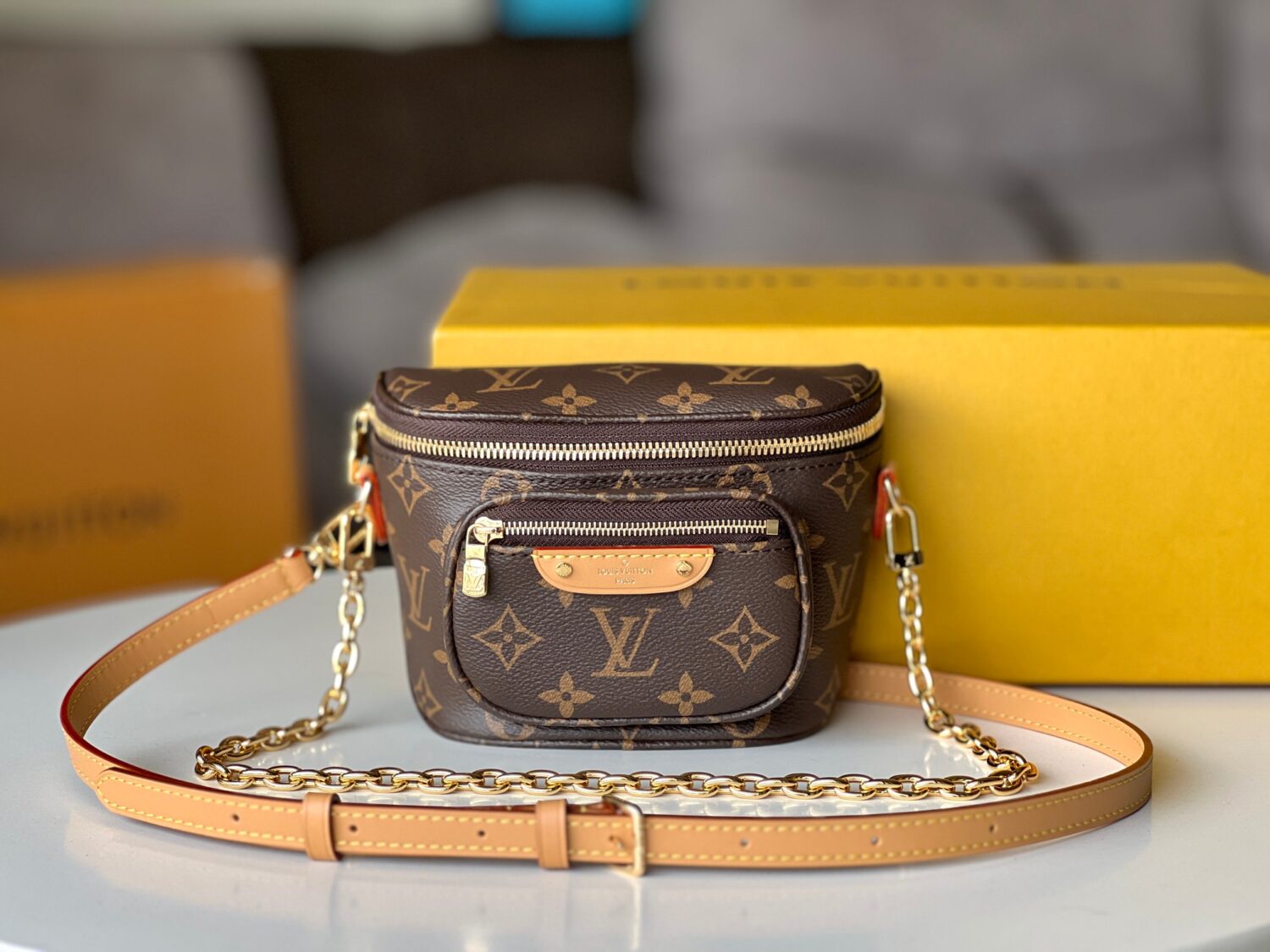 Louis Vuitton【Mini Bumbag】M82335 Monogram Canvas This Mini Bumbag is from the LV Gradient series.