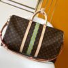 1 Louis Vuitton 2295 Monogram 50CM 163c01 Dynamic Chip This Keepall Bandoulière 50 travel bag features the Monogram design.