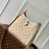 1 Louis Vuitton M27459 Off-white All Around small handbag from the Mahina series.