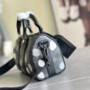 1 Louis Vuitton M46406 Black Floral Polka Dot Yayoi Kusama Handbag: This handbag encapsulates the classic silhouette of a travel bag and is crafted from embossed leather.
