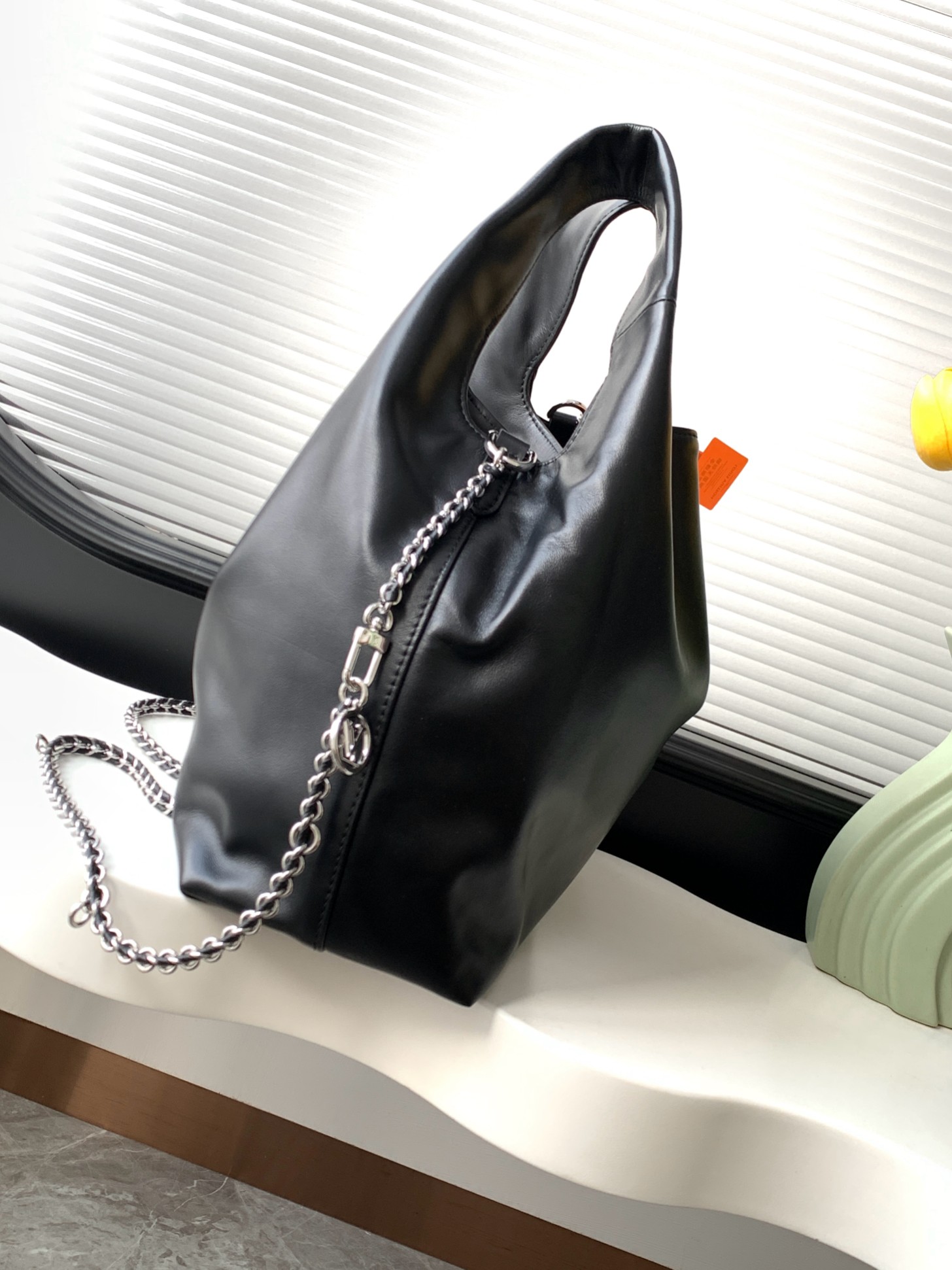 1 Louis Vuitton The M11266 Atlantis medium handbag is from the Dark Side collection.