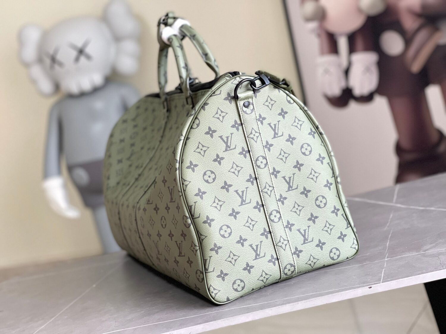 1 Louis Vuitton Keepall size 45 travel bag, style numbers 23962 and 23963, dyed in a pastel hue reminiscent of the rising sun.