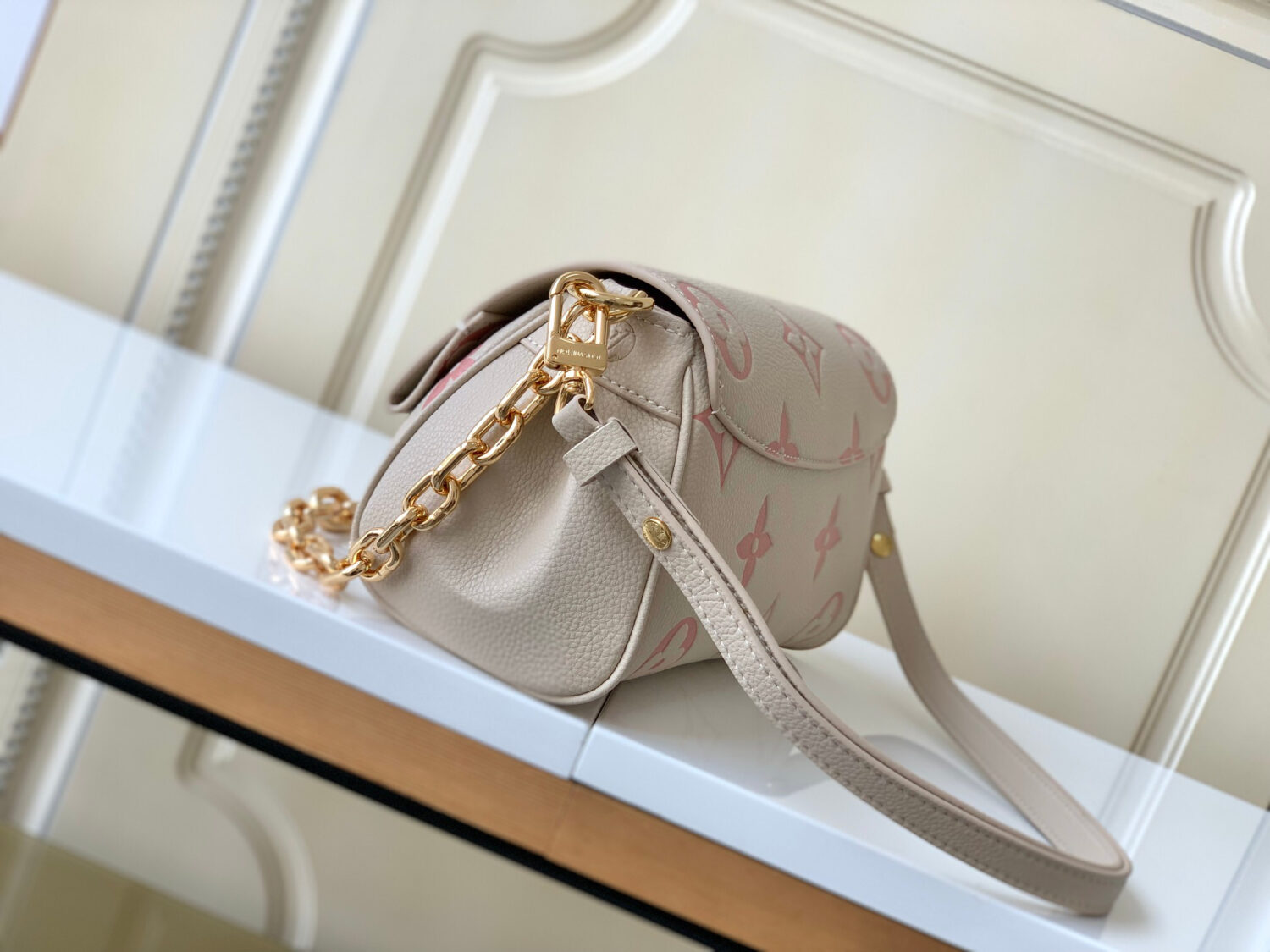 Louis Vuitton The M46393 Favorite handbag is crafted from Monogram Empreinte embossed leather.