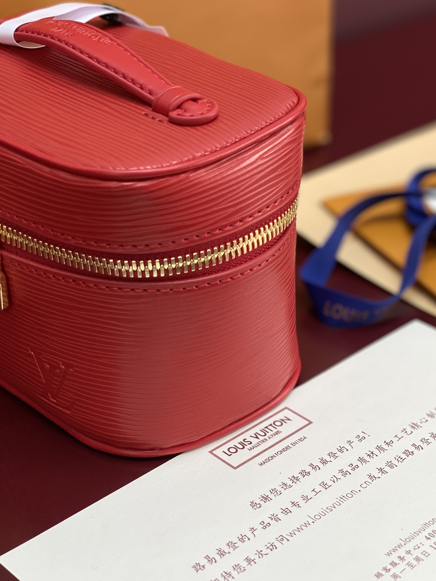 2 Louis Vuitton M25855 Red Small! New Season NICE NANO Bag with Grain Texture. This Nice Nano bag features a grained finish.