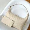 2 Louis Vuitton The Sac Sport handbag features a curved silhouette crafted from supple Monogram Empreinte embossed leather.