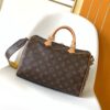 2 Louis Vuitton The Speedy Soft 30 Boho handbag is made from classic Monogram coated canvas.