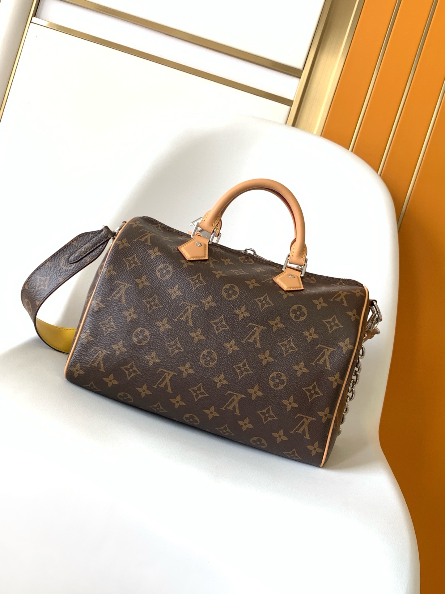 2 Louis Vuitton The Speedy Soft 30 Boho handbag is made from classic Monogram coated canvas.