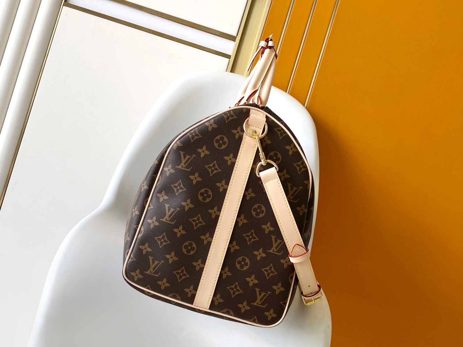 2 Louis Vuitton The Keepall Bandoulière 55 travel bag cleverly utilizes Monogram canvas to create ample space.