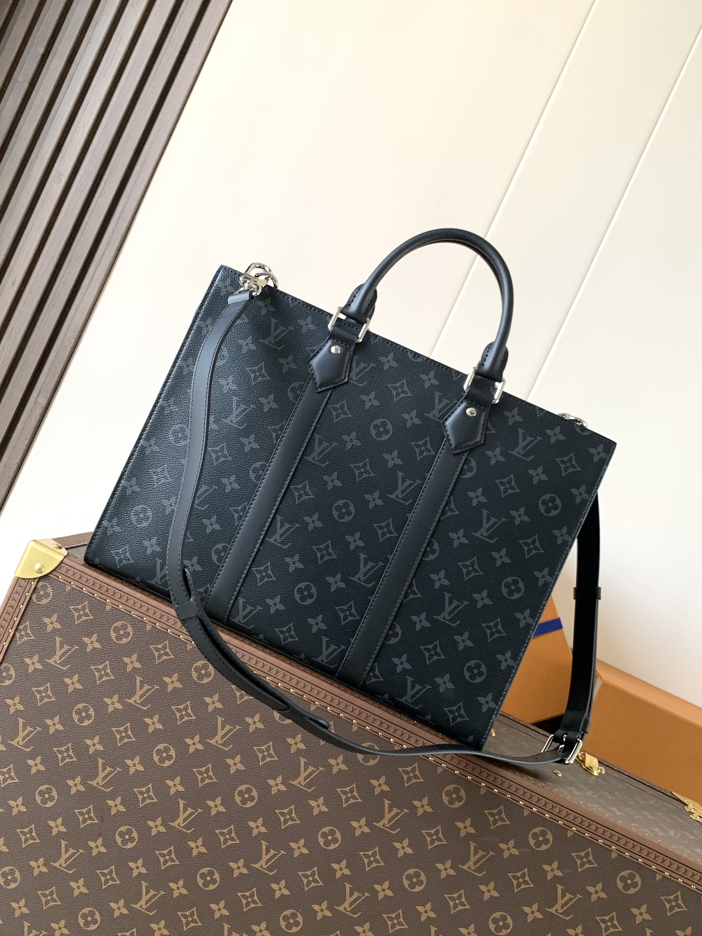 2 Louis Vuitton The M11742 black floral briefcase with zipper and 163C microcode chip is a Sac Plat 24H handbag with the elegant style of Monogram Eclipse coated canvas.
